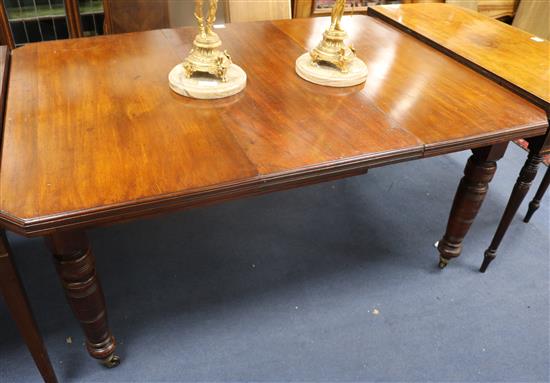A mahogany extending dining table, L.150cm fully extended